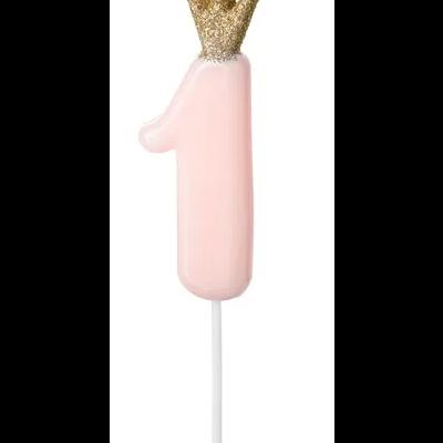 Vela cor de rosa número 1 com coroa dourada brilhante no topo em suporte branco