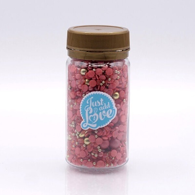 Frasco transparente com tampa castanha e confeitos coloridos dentro