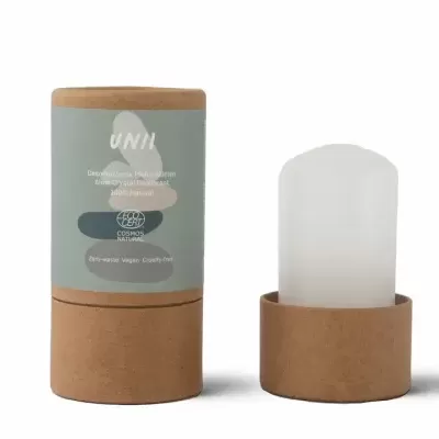 Desodorizante Pedra Alumínio em embalagem de cartão com rótulo verde e pedra translúcida