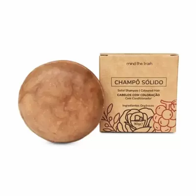 Champô sólido castanho claro com embalagem de cartão com texto em português