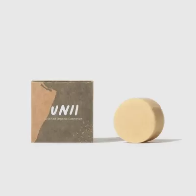 Barra de cosmético sólido bege com embalagem UNII em papel reciclado