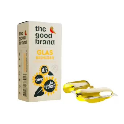 Embalagem branca de produto de limpeza de vidros com cápsulas amarelas