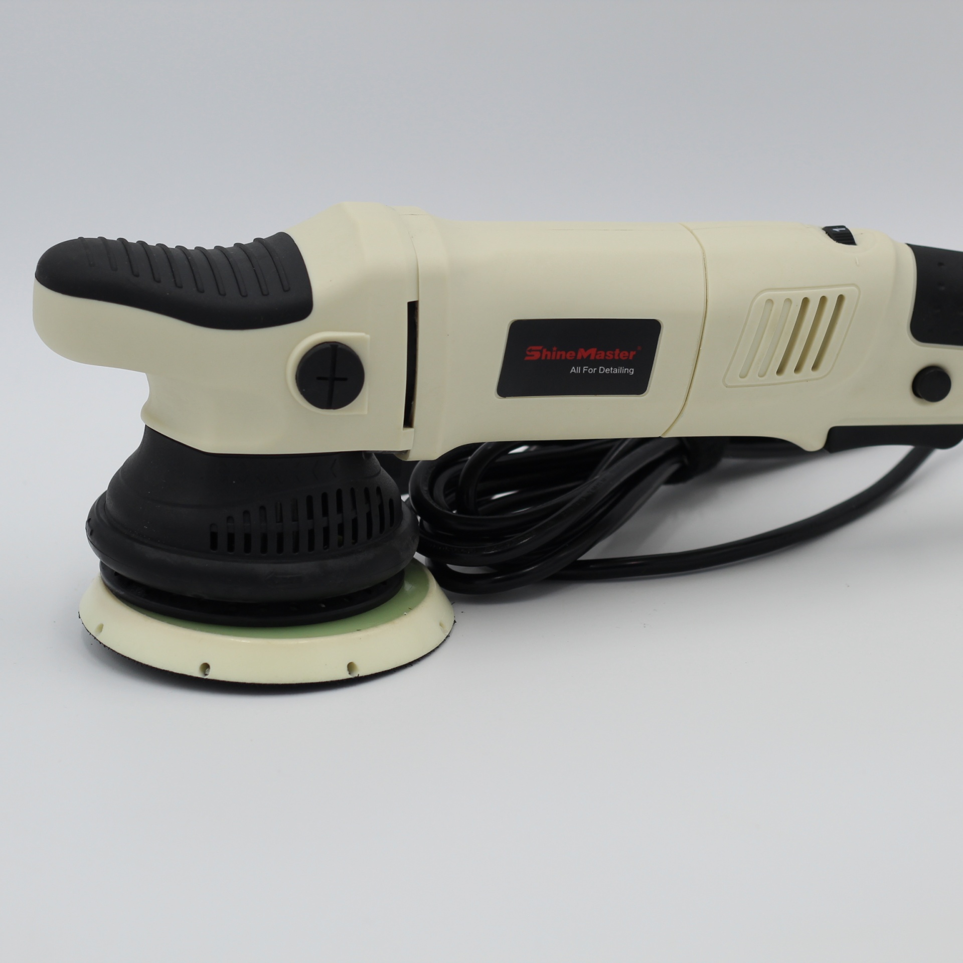 Politriz elÃ©trica creme e preta com disco circular de polimento