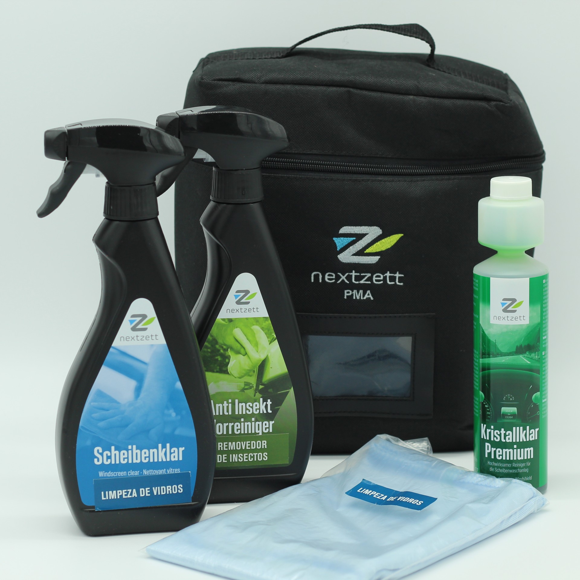 Conjunto de produtos de limpeza nextzett com pulverizadores, garrafa, toalha e bolsa preta