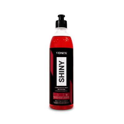 Frasco de produto vermelho com rótulo preto e texto branco VONIXX SHINY