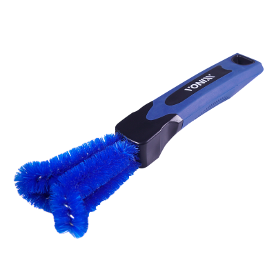 Escova de limpeza azul e preta com cerdas azuis e cabo com marca VONIX