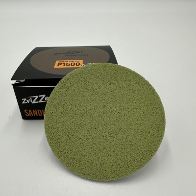 Disco de lixa verde redondo com embalagem preta