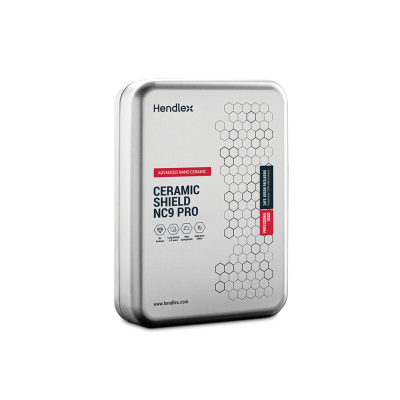 Embalagem metálica prateada com texto e design hexagonal preto