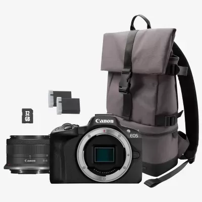 Câmara Canon EOS, lente, cartões de memória e mochila cinzenta