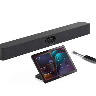 Barra de som preta com ecrã tátil e comando remoto sobre superfície branca