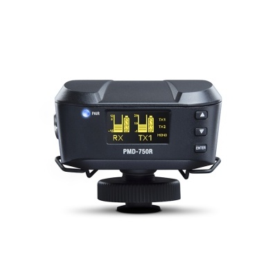 Dispositivo eletrónico preto PMD-750R com visor digital amarelo montado numa base preta