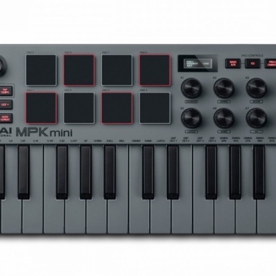 Controlador MIDI AKAI MPK mini cinza com teclas brancas e pretas e pads vermelhos