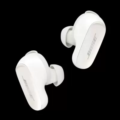 Auriculares sem fios brancos BOSE com pontas de silicone em fundo preto