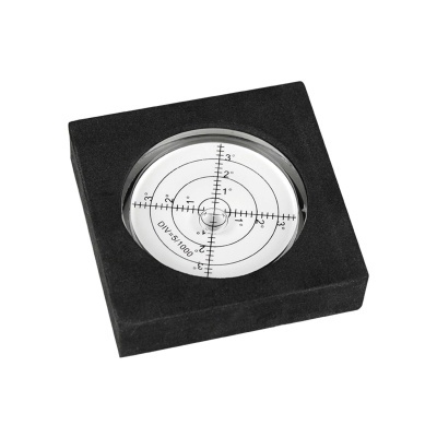 Nível circular preto com escala de medição em graus