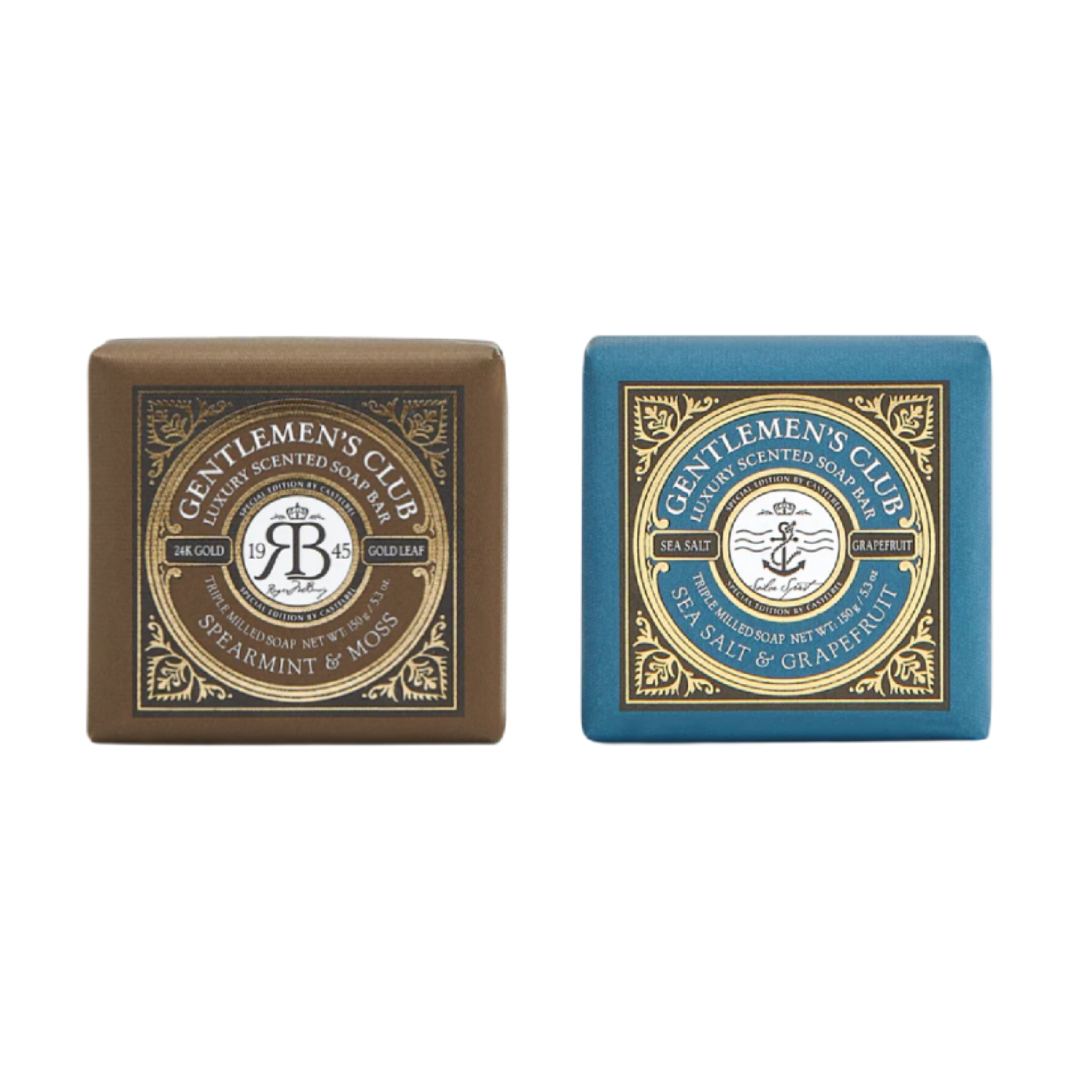 Castelbel - Sabonetes Gentlemen's Club Duas barras de sabão embaladas com design elegante, uma castanha e outra azul.