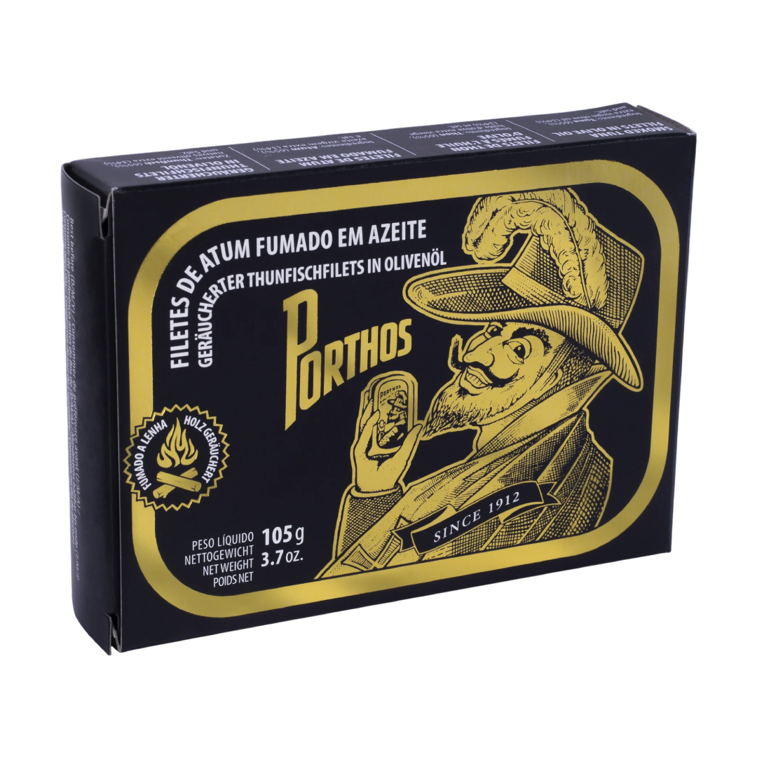 Porthos - Filetes de Atum Fumado em Azeite Embalagem preta e dourada de filetes de atum fumado em azeite Porthos
