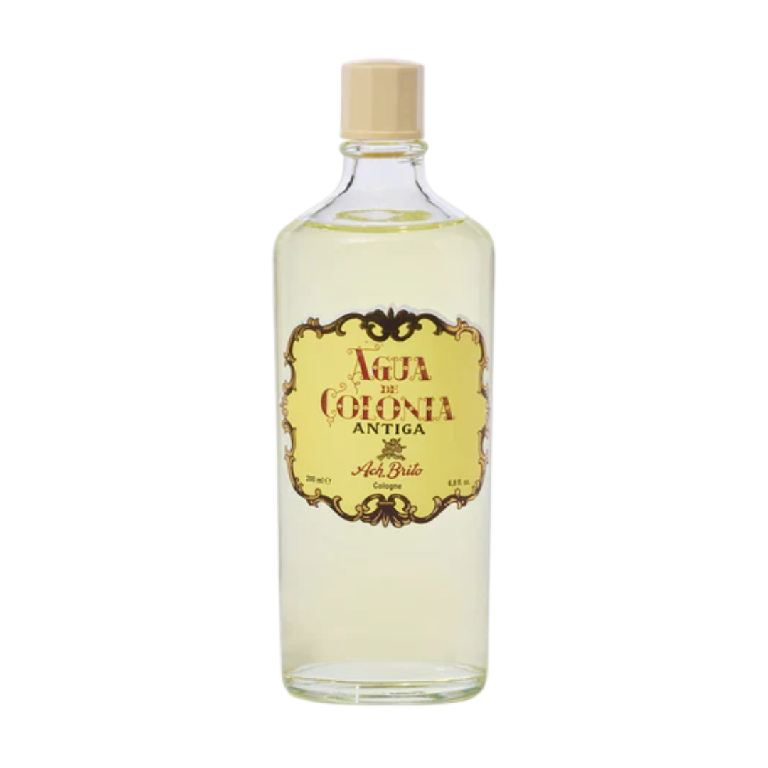 Ach. Brito - Água de Colónia Antiga Gar flask containing yellow liquid with decorative label