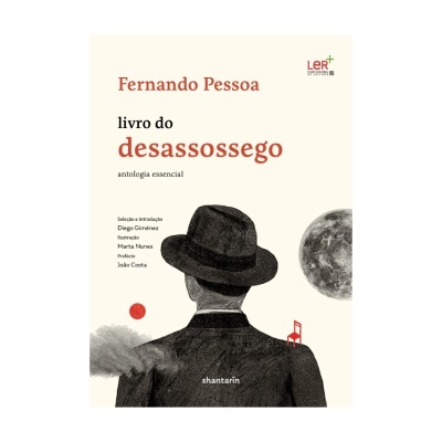 Capa do livro Livro do desassossego de Fernando Pessoa com ilustração de homem de costas, lua e cadeira vermelha