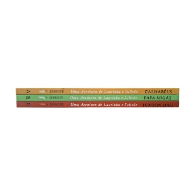Três livros coloridos empilhados com títulos visíveis