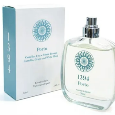 Frasco de perfume e sua embalagem da fragrância 1394 Porto.