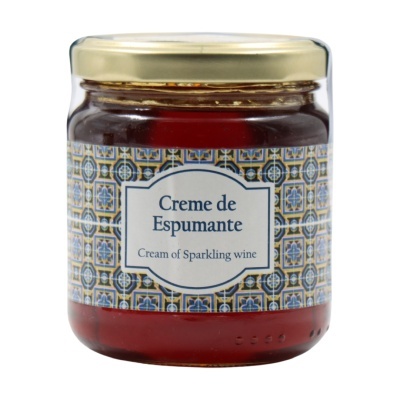 Frasco de creme de espumante com rótulo decorativo e tampa dourada