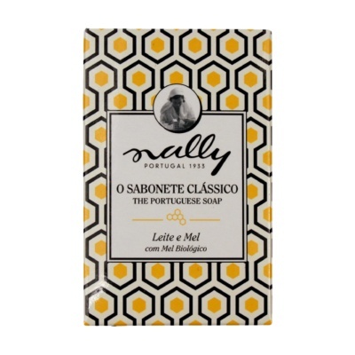 Sabonete O Sabonete Clássico Leite e Mel embalado com design hexagonal amarelo e preto