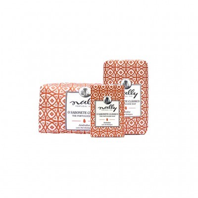 Três sabonetes clássicos Nally embalados em papel com padrão geométrico laranja e branco