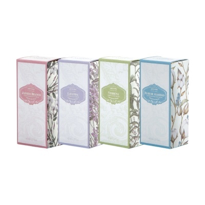 Caixas de creme de mãos com design floral e diferentes cores de rótulos