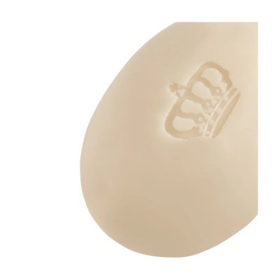 Produto redondo bege com relevo de coroa