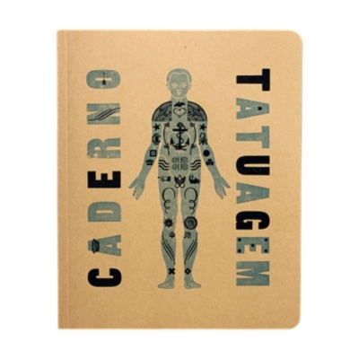 Caderno castanho com texto e ilustração de tatuagens