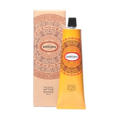 Frasco amarelo de bálsamo after shave com caixa decorada