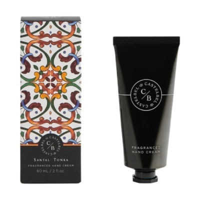 Frasco preto de creme de mãos e caixa decorativa colorida