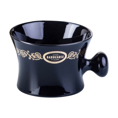 Taça preta de cerâmica com padrão dourado e cabo redondo
