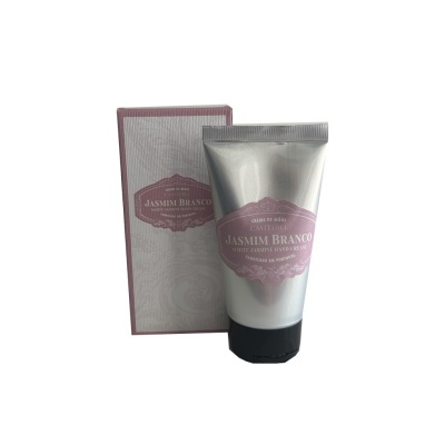 creme para as mãos Jasmin Branco em tubo prateado com tampa preta e caixa branca com detalhes rosa