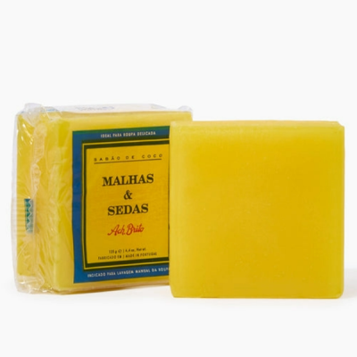 Sabão amarelo sólido com rótulo amarelo e azul