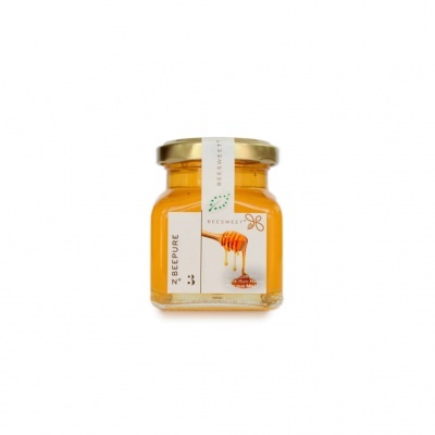 Frasco de mel ZEDOPURE em vidro com tampa dourada.