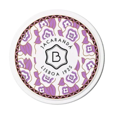 Lata redonda branca com tampa decorada com flores lilás e texto JACARANDÁ LISBOA 1925