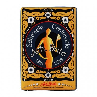 Caixa de sabonete amarelo e preto com figura humana e texto comemorativo