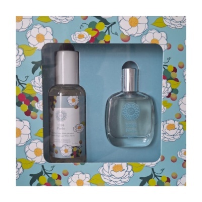 Conjunto shampoo e perfume em caixa azul floral