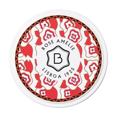 Tampa de frasco branco com padrão floral vermelho e texto Rose Amélie Lisboa 1925