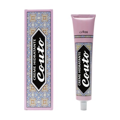 Creme hidratante Coutto em tubo rosa com padrão azulejar e embalagem correspondente
