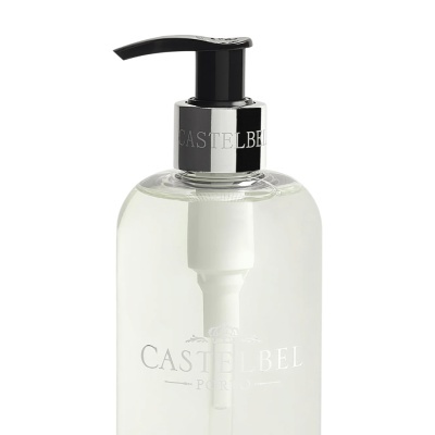 Frasco transparente de dispensador com detalhes pretos e prateados da marca CASTELBEL