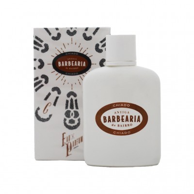 Frasco branco de perfume e caixa com texto ANTIGA BARBEARIA de BAIRRO CHIADO