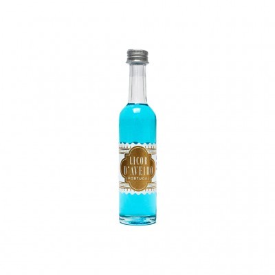 Garrafa de licor azul com rótulo dourado