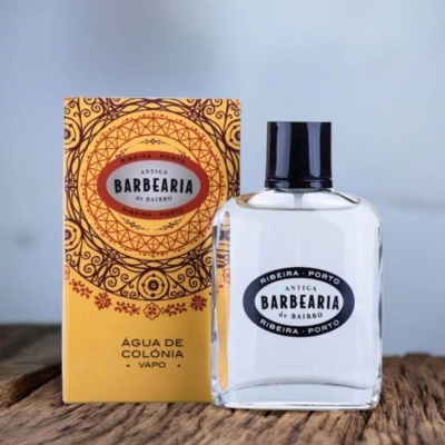 Frasco de água de colónia e caixa decorativa amarela e castanha