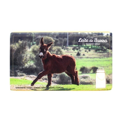 Embalagem de sabonete com imagem de burro e texto Leite de Burra