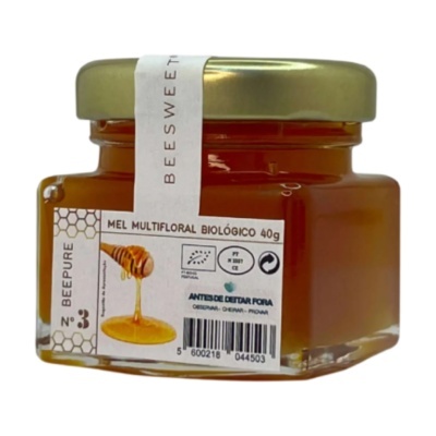 Frasco de mel multifloral biológico com tampa dourada