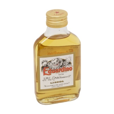 Garrafa de licor Eduardino com rótulo branco e imagem de palhaço