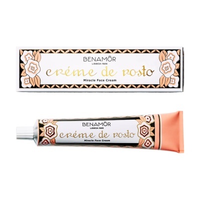 Embalagem e tubo de creme de rosto Benamôr com design floral e texto em dourado.
