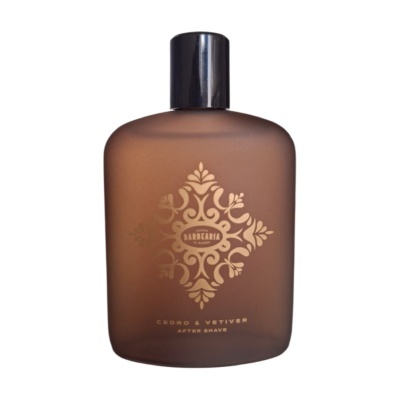 Frasco castanho de after shave com design dourado e tampa preta